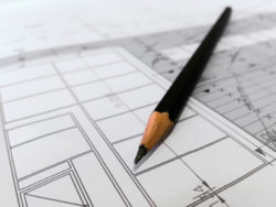 pen with architect plans | Honor Credit Union