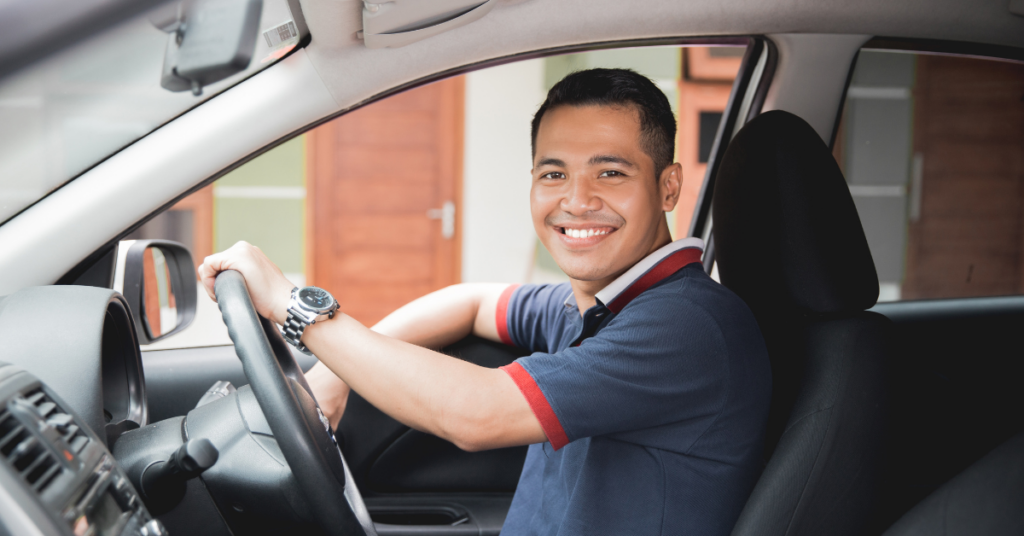 man in the driver's seat of a car | Honor Credit Union