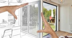 use a home equity loan from honor credit union for home improvement projects, vacation, weddings, debt consolidation, and more; photo of two hands squaring up a drawing concept of a kitchen remodel | Honor Credit Union