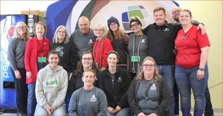 honor adoption day at berrien county animal control on november 16, 2019; photo of volunteers posing for a photo on adoption day