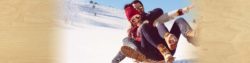 build up your savings account with a high interest money market from honor credit union; family sledding down a snowy hill | Honor Credit Union