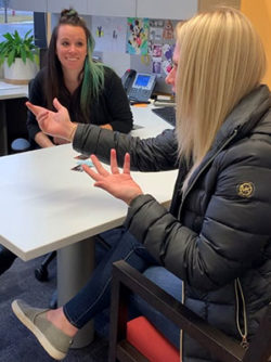 an honor credit union member is frustrated with her credit card debt and is looking for answers at an honor member center | Honor Credit Union