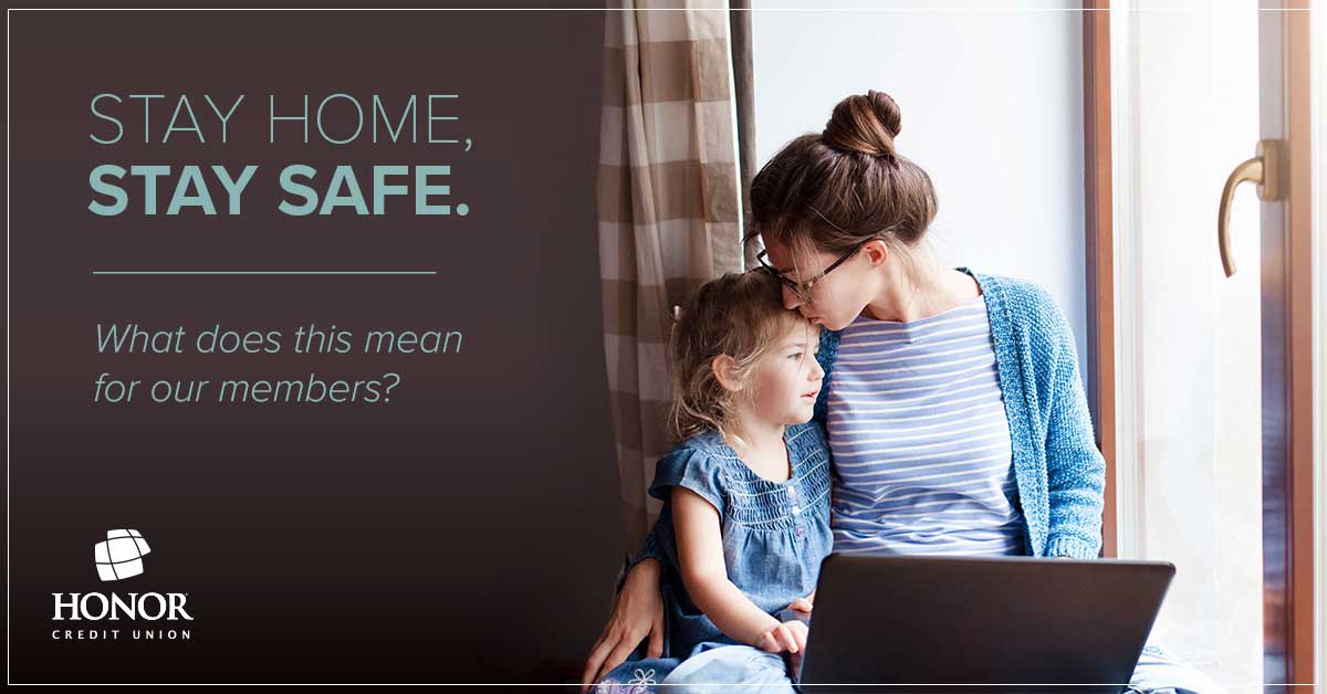 image of a mother embracing her daughter while sitting near a window