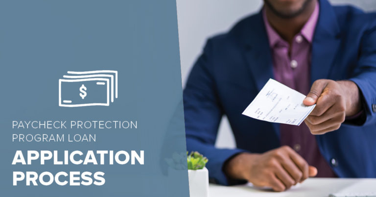 image of a businessman holding a check