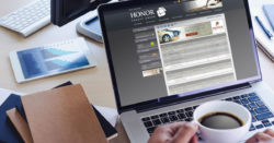 photo of a laptop computer open with honor credit union online banking open in a browser | Honor Credit Union