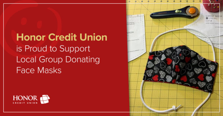 image of a homemade cloth mask with text that says honor credit union is proud to support local group donating face masks