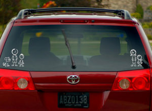 image of a stick figure family on a rear windshield of a vehicle | Honor Credit Union
