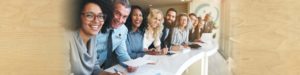 image of a group of multi-racial people meeting together at a table | Honor Credit Union