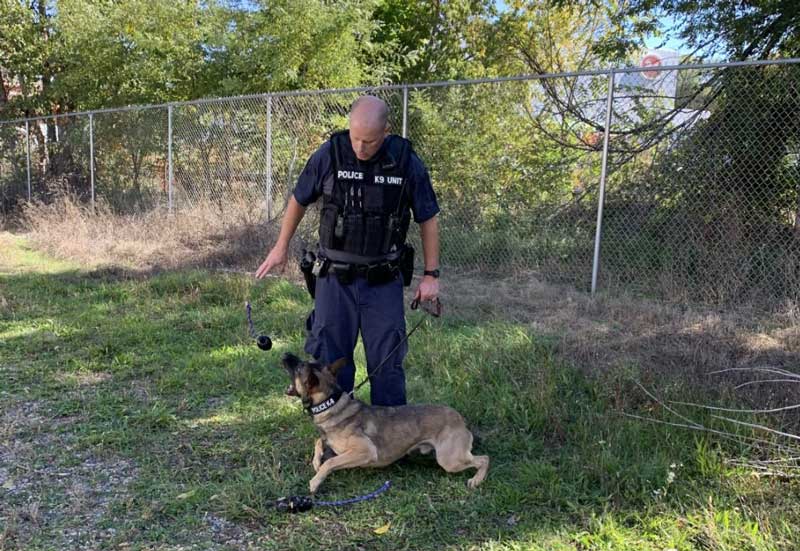photo of battle creek police department patrol dog skube with handler corporal kevin farnham