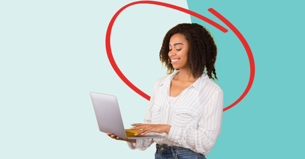 young women using a laptop smiling