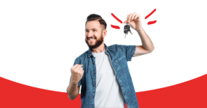 man holding car keys in one hand and a his other hand in a fist with excitement about his asset protection GAP insurance | Honor Credit Union
