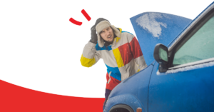 man in winter hat and coat with his broken-down car | Honor Credit Union
