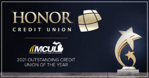 image of a trophy on a blue background with text explaining honor credit union won an award from the michigan credit union league | Honor Credit Union