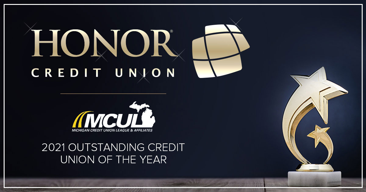 image of a trophy on a blue background with text explaining honor credit union won an award from the michigan credit union league