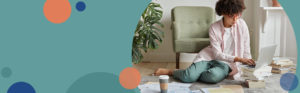 image of a woman sitting on the floor of a room surrounded by documents; the background of the image has orange and blue circles on a solid teal color background | Honor Credit Union