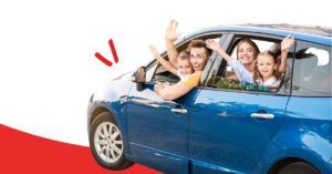 family of four in a blue car waving happily | Honor Credit Union