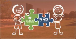 image featuring two stick figures holding puzzle pieces that feature the honor credit union logo and the atl federal credit union logo on a background photo of grand rapids, michigan with an orange color overlay | Honor Credit Union