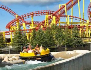 photo of a people sitting on a water ride at an amusement park | Honor Credit Union