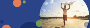 woman running with her hands in the air crossing the finish line | Honor Credit Union