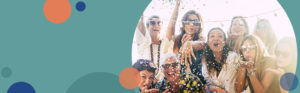 photo of a group of women smiling and having fun outside while confetti falls | Honor Credit Union