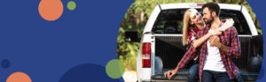 man and woman sitting on a truck tailgate | Honor Credit Union
