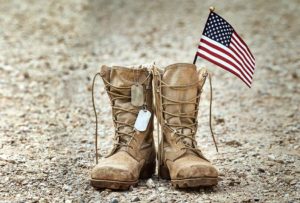 military boots with american flag in one boot | Honor Credit Union