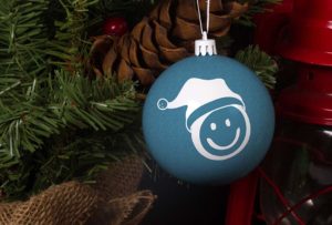christmas ornament with an honor smiley face decal | Honor Credit Union