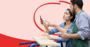 women shopping at a home improvement store asking questions to a store clerk | Honor Credit Union