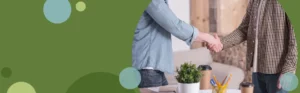 photo of two men shaking hands in an informal setting | Honor Credit Union