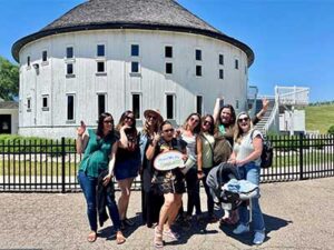 group of teachers posing for a photo at round barn estate | Honor Credit Union