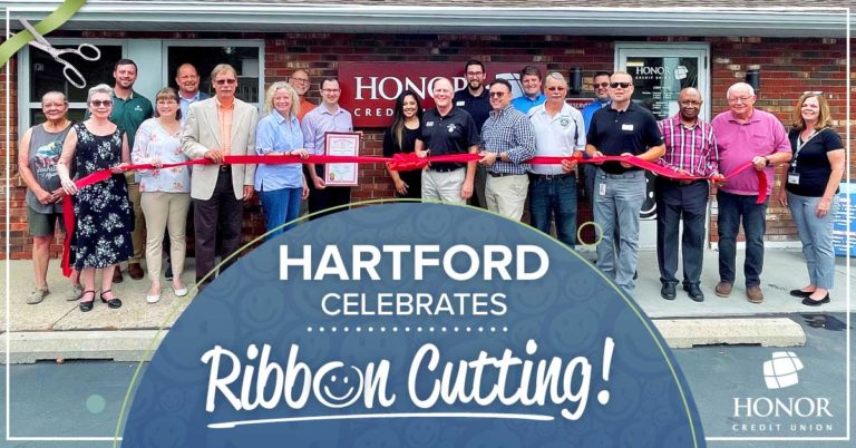 various honor team members and community members posing for a photo during the hartford member center grand opening