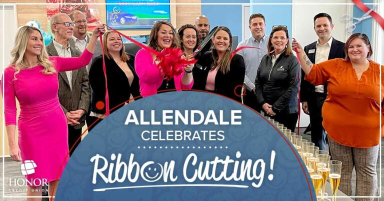 photo of honor credit union team members cutting the ribbon at the allendale member center