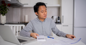 man filing taxes | Honor Credit Union