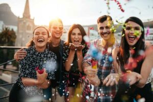 friends celebrating together outside | Honor Credit Union