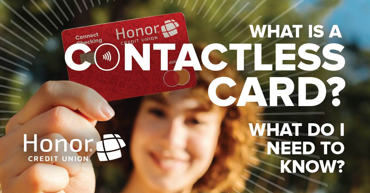 woman holding an honor debit card that displays a contactless payment symbol
