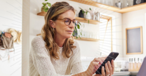 women on her cell phone | Honor Credit Union