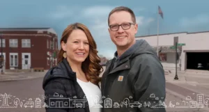 man and woman standing next to each other in downtown baroda, michigan. | Honor Credit Union