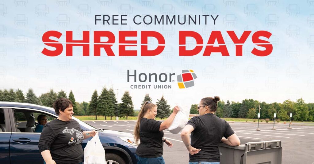 honor team members volunteering at a community shred day event