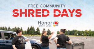 honor team members volunteering at a community shred day event | Honor Credit Union