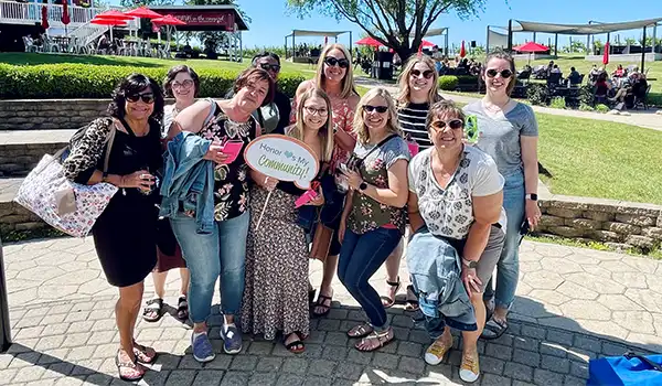 group of teachers posing for a picture at Round Barn Estate