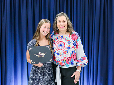 scholarship winner with an honor team member