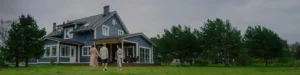 photo of a couple walking towards a house with a realtor | Honor Credit Union