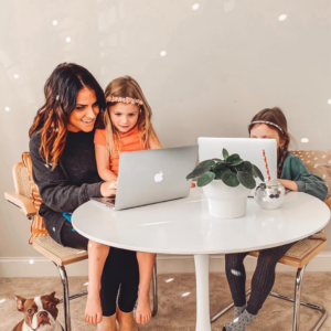 Mother with children on laptops | Honor Credit Union