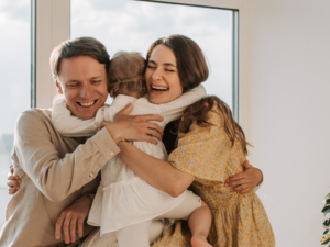family embracing | Honor Credit Union