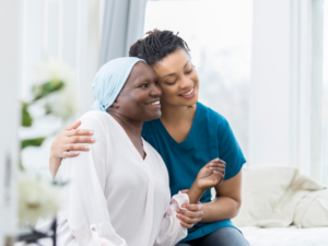 two women hugging | Honor Credit Union