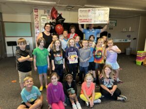 Teacher Awards Winner Ann Armbruster of Portage Public Schools with her class | Honor Credit Union