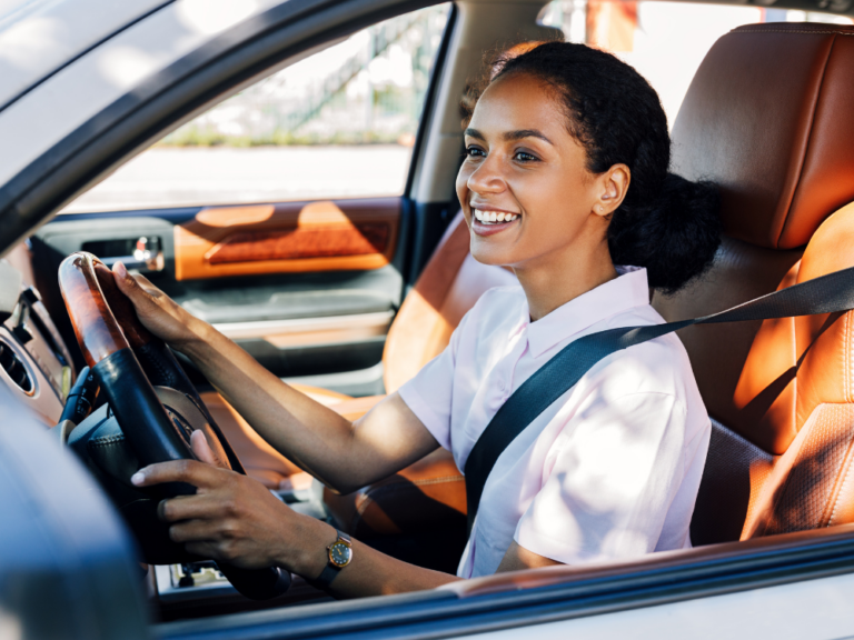 young women driving a car