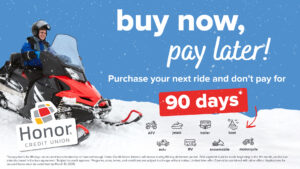 buy no pay later, purchase you next ride and don't pay for 90 days. Man riding a snowmobile | Honor Credit Union