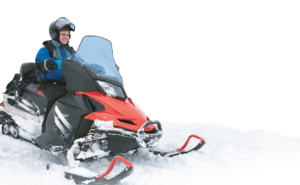 man driving a snowmobile