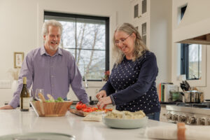 couple preparing food in the kitchen together | Honor Credit Union